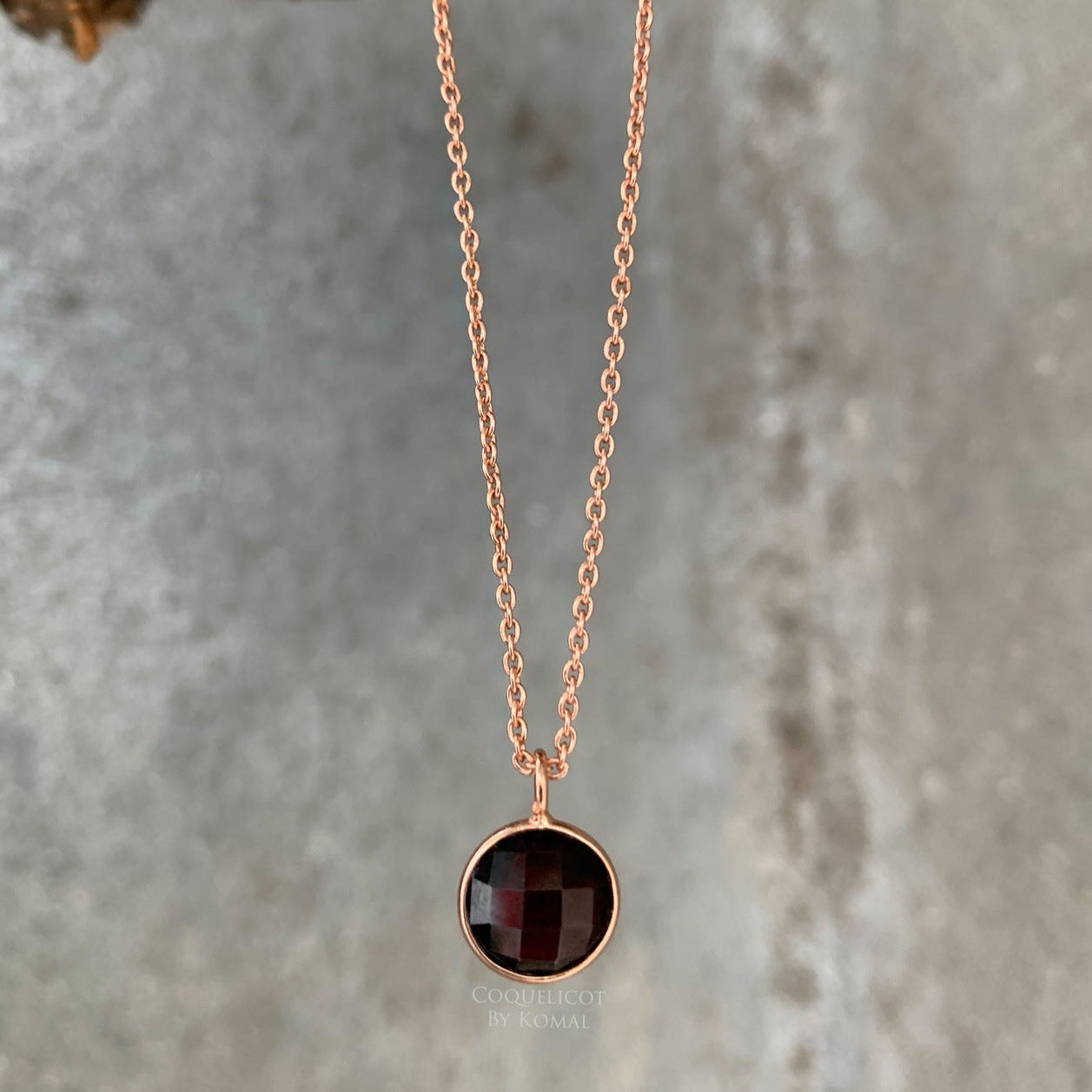 Garnet Necklace with 10mm round cut pendant, chain and fine Rose Gold polish. This dainty women's jewellery is a perfect spiritual and unique gift.