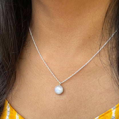 10mm white Rainbow Moonstone pendant placed in a 18 inches chain with fine polish. Handcrafted jewellery that is a unique spiritual gift.